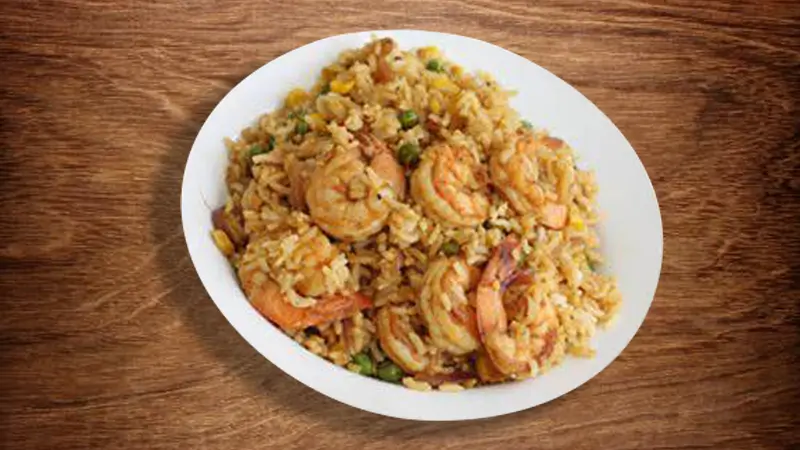 Shrimp fried rice with vegetables and plump shrimp at Wings & Seafood, a Seafood Restaurant in Ridgewood
